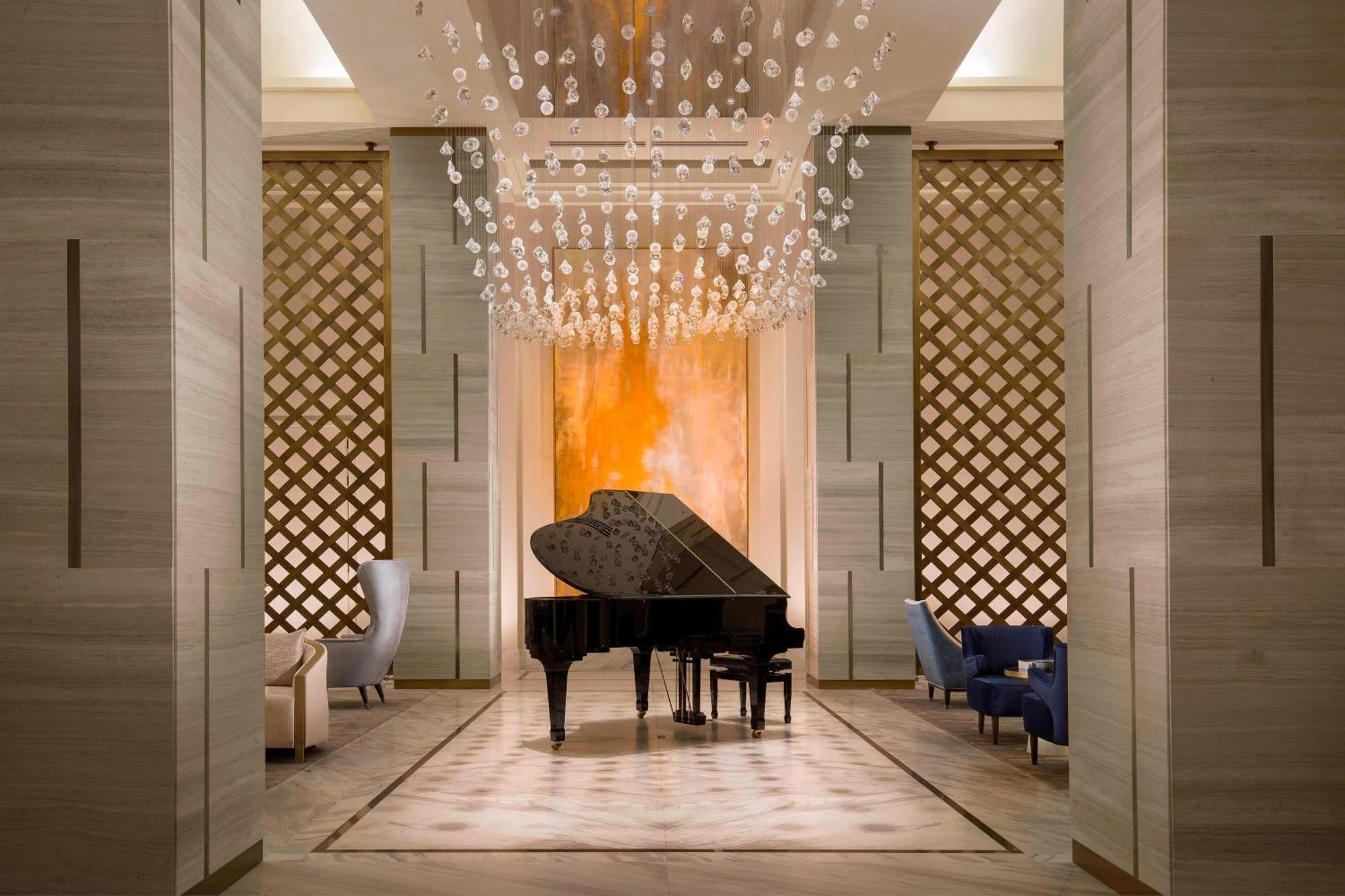 The St. Regis Astana Exterior foto The piano at the lobby